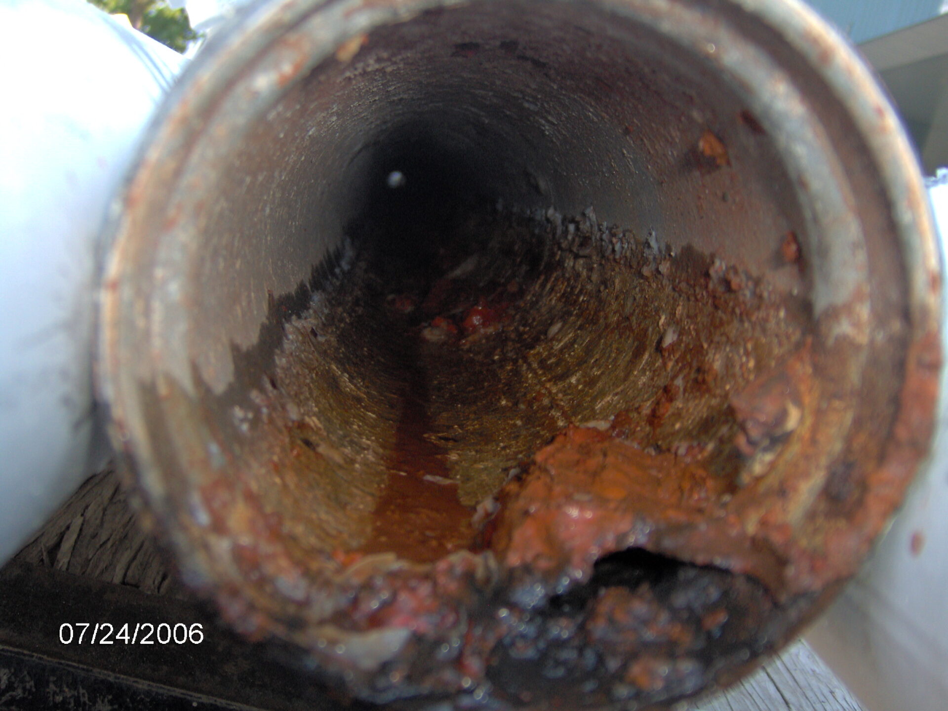 A corrosive build-up in the pipe