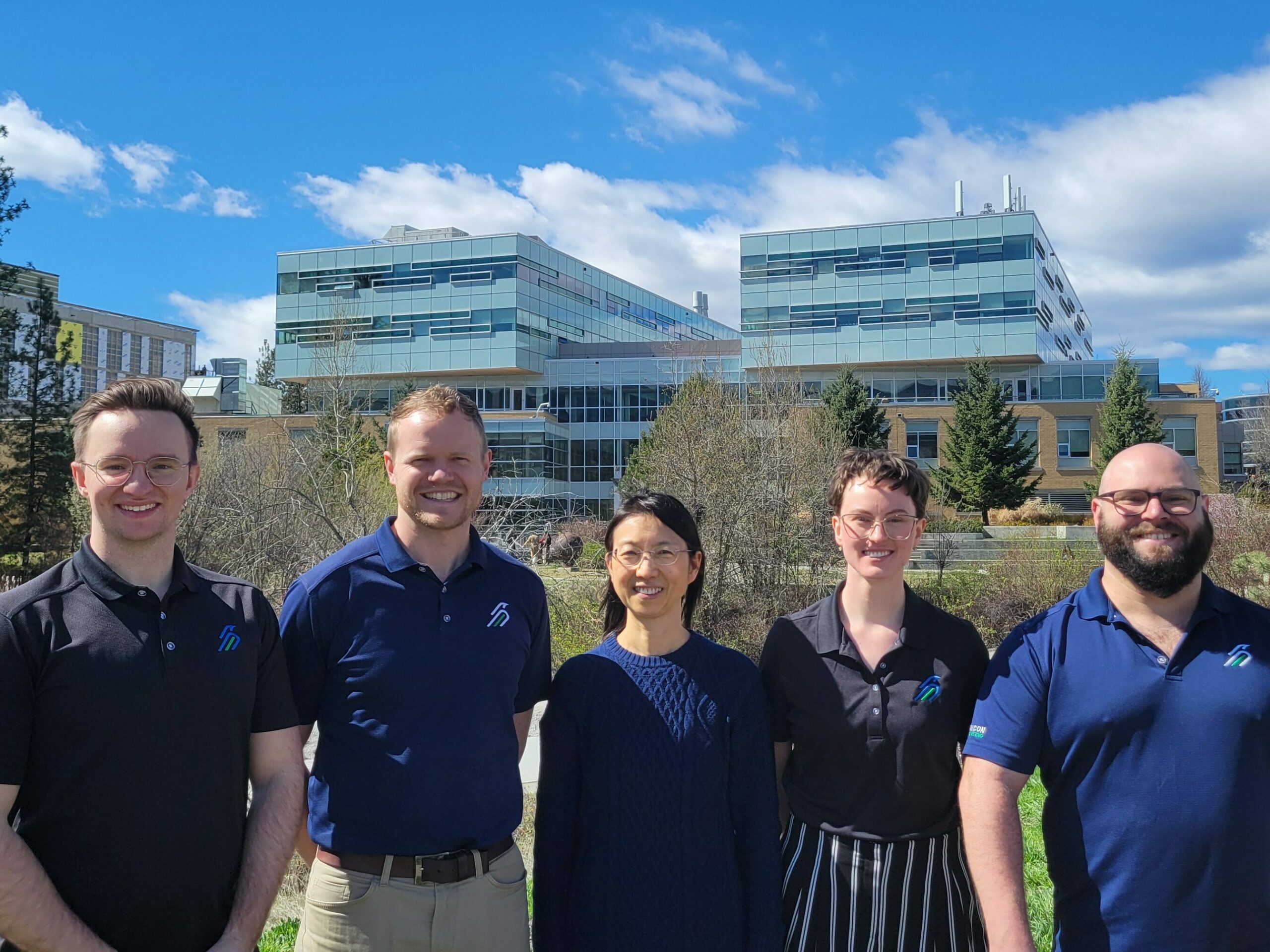 Falcon's Engineers in Training with Dr. Yan in front of the UBCO Engineering building